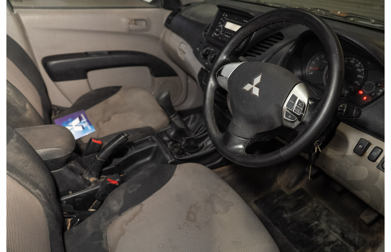 12/2009 Mitsubishi Triton GL-R (4x4) MN MY10 Double Cab Utility SIlver Turbo Diesel 2.5L