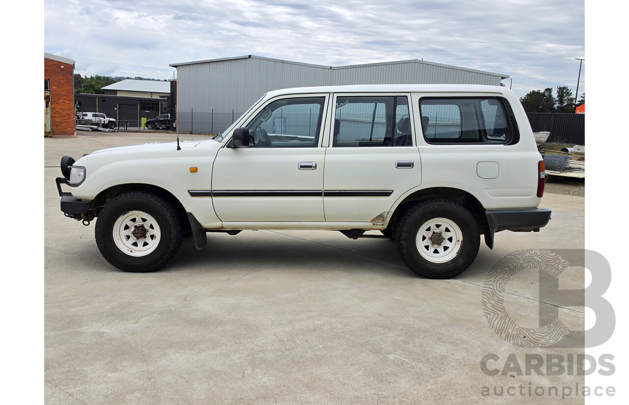 11/1995 Toyota Landcruiser DX (4x4) HZJ80R 4d Wagon White Diesel 4.2L