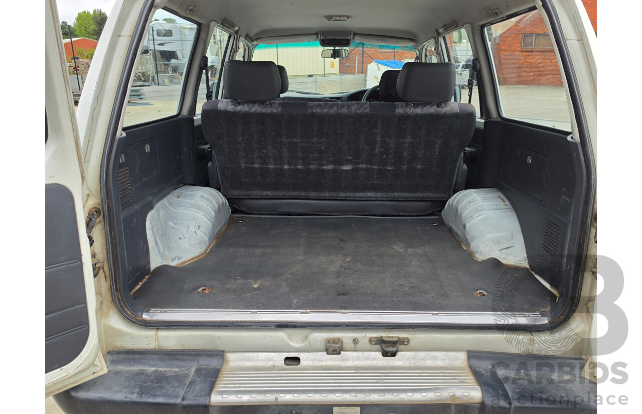 11/1995 Toyota Landcruiser DX (4x4) HZJ80R 4d Wagon White Diesel 4.2L