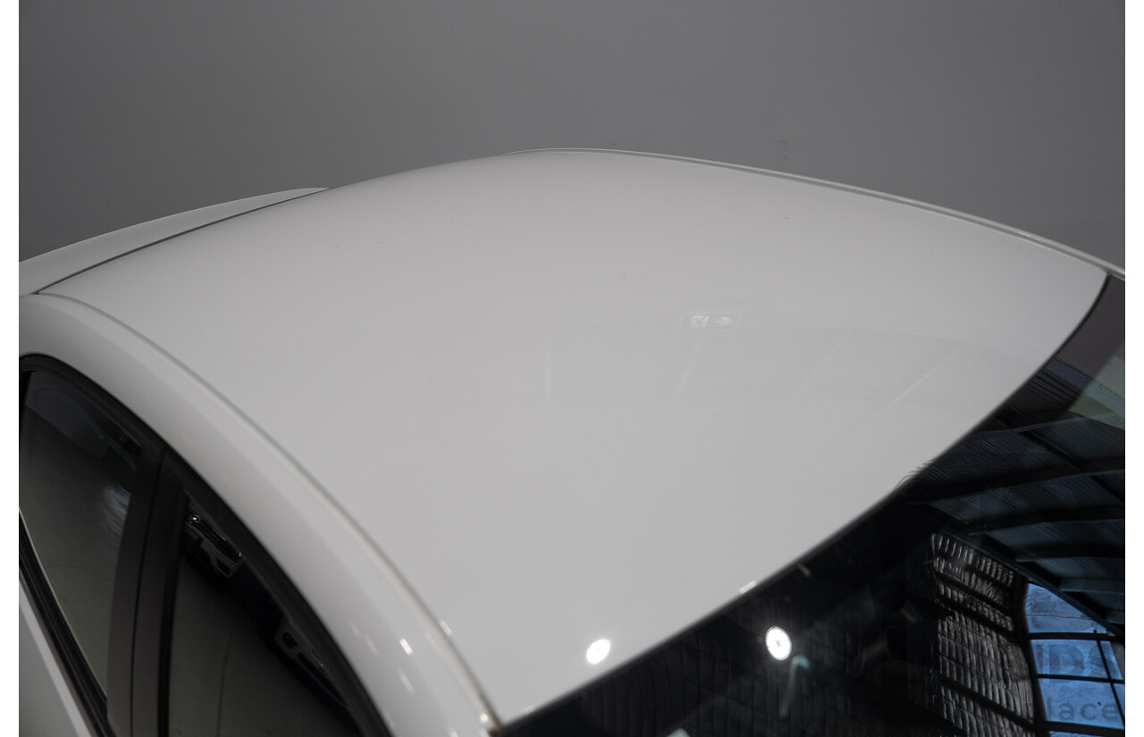 11/2014 Holden Malibu CD EM 4d Sedan Summit White Turbo Diesel 2.0L