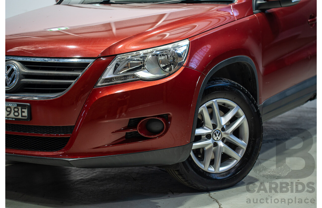05/2008 Volkswagen Tiguan 103 TDI 4Motion (AWD) 5NC MY09 4d Wagon Wild Cherry Red Metallic Turbo Diesel 2.0L