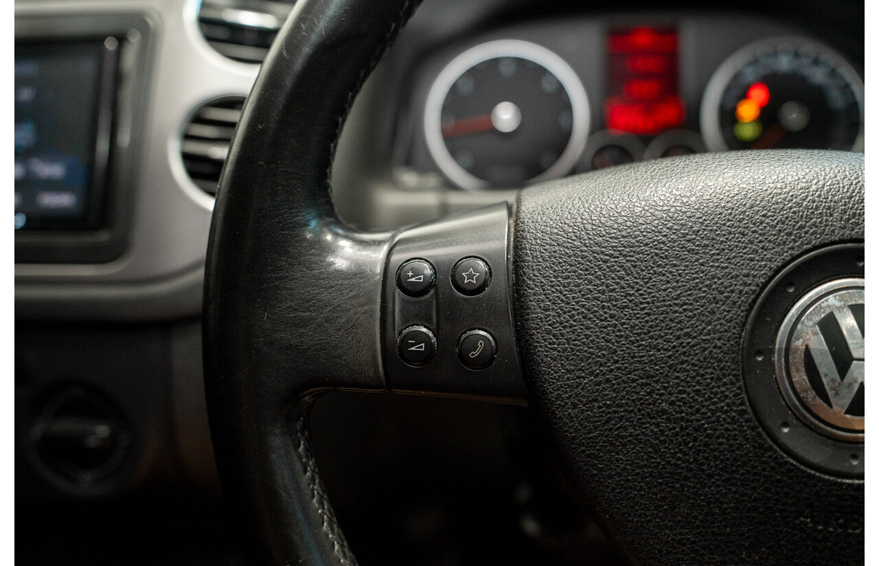 05/2008 Volkswagen Tiguan 103 TDI 4Motion (AWD) 5NC MY09 4d Wagon Wild Cherry Red Metallic Turbo Diesel 2.0L