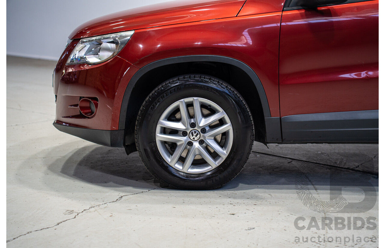 05/2008 Volkswagen Tiguan 103 TDI 4Motion (AWD) 5NC MY09 4d Wagon Wild Cherry Red Metallic Turbo Diesel 2.0L