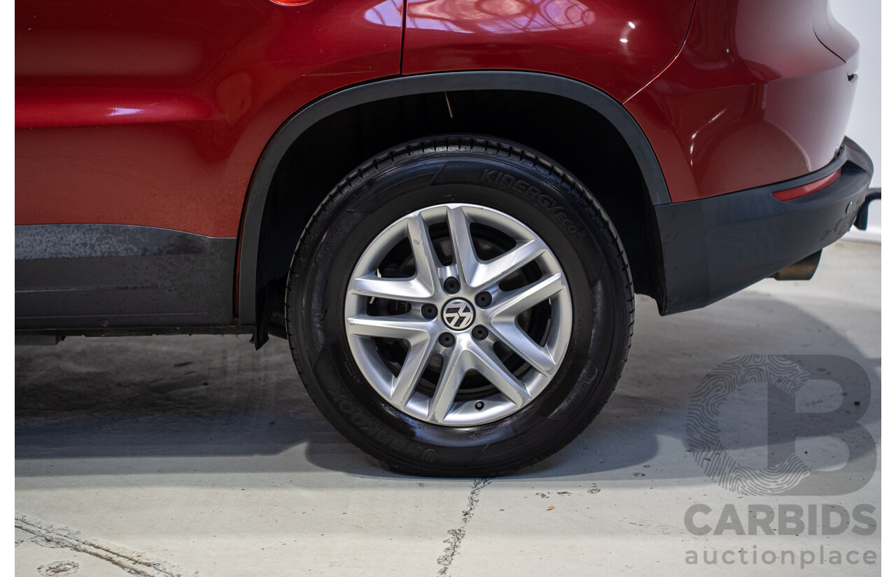 05/2008 Volkswagen Tiguan 103 TDI 4Motion (AWD) 5NC MY09 4d Wagon Wild Cherry Red Metallic Turbo Diesel 2.0L