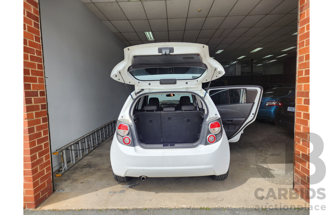 11/2012 Holden Barina  TM 5d Hatchback White 1.6L