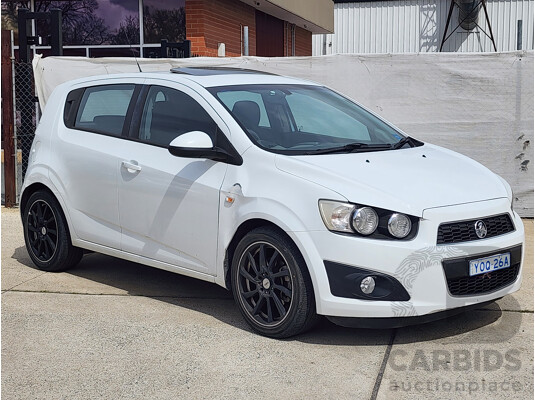 11/2012 Holden Barina  TM 5d Hatchback White 1.6L