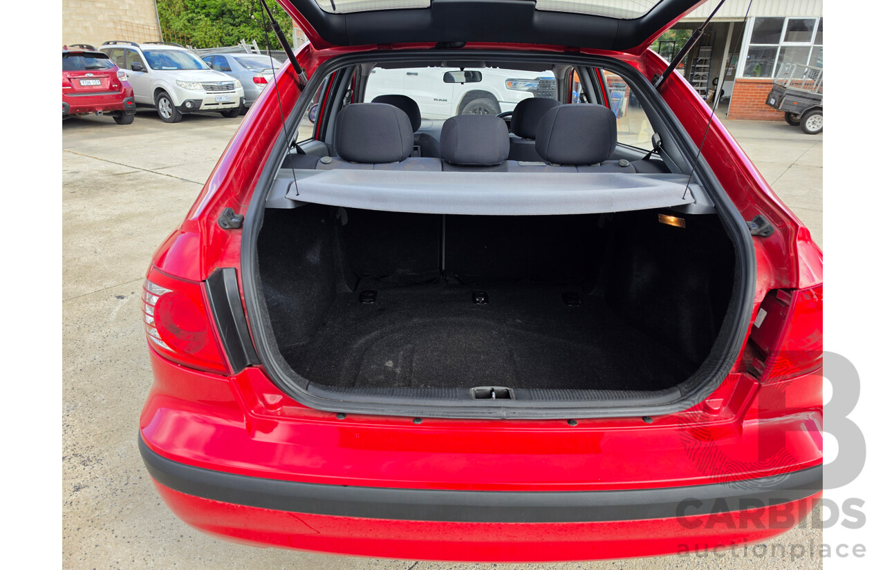 07/2005 Hyundai Elantra FX 2.0 HVT XD MY05 5d Hatchback Red 2.0L